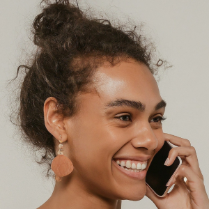 Woman accessing Listening service on the phone